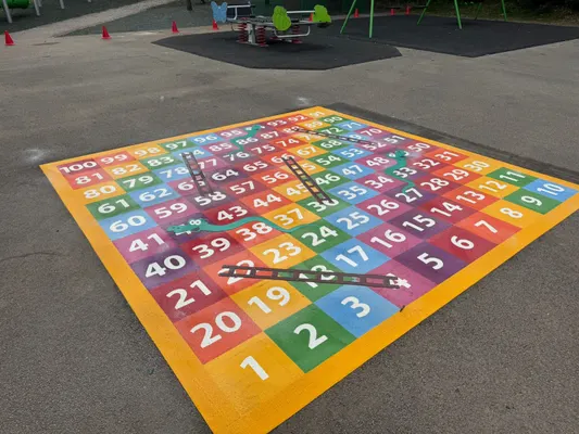 Giant 1 to 100 snakes and ladders playground marking
