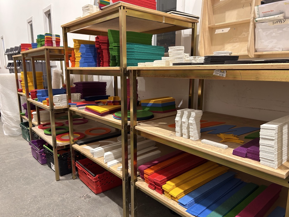 Sheets of pre-cut preformed thermoplastic designs stored ready for installation
